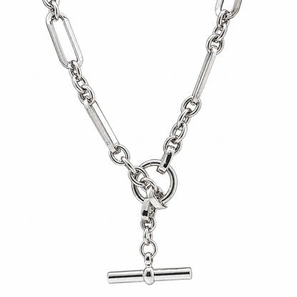A silver paperclip necklace featuring a toggle clasp with a horizontal bar pendant